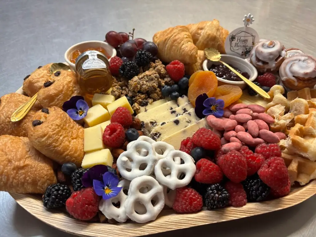 A gourmet charcuterie board featuring brunch food and various appetizers for a perfect dining experience.