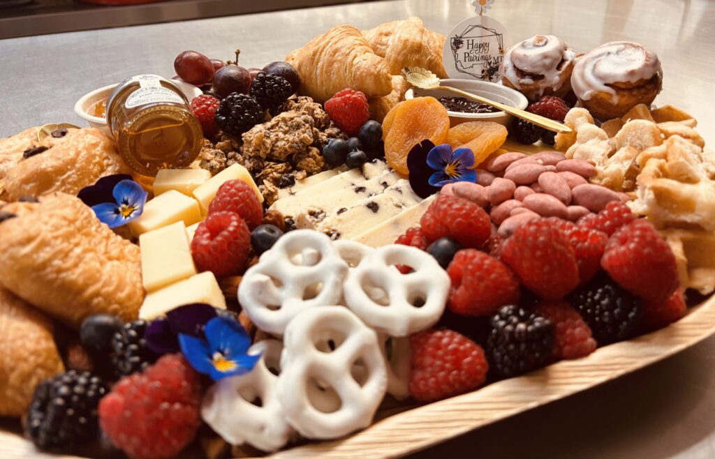 A gourmet charcuterie board featuring brunch food and various appetizers for a perfect dining experience.