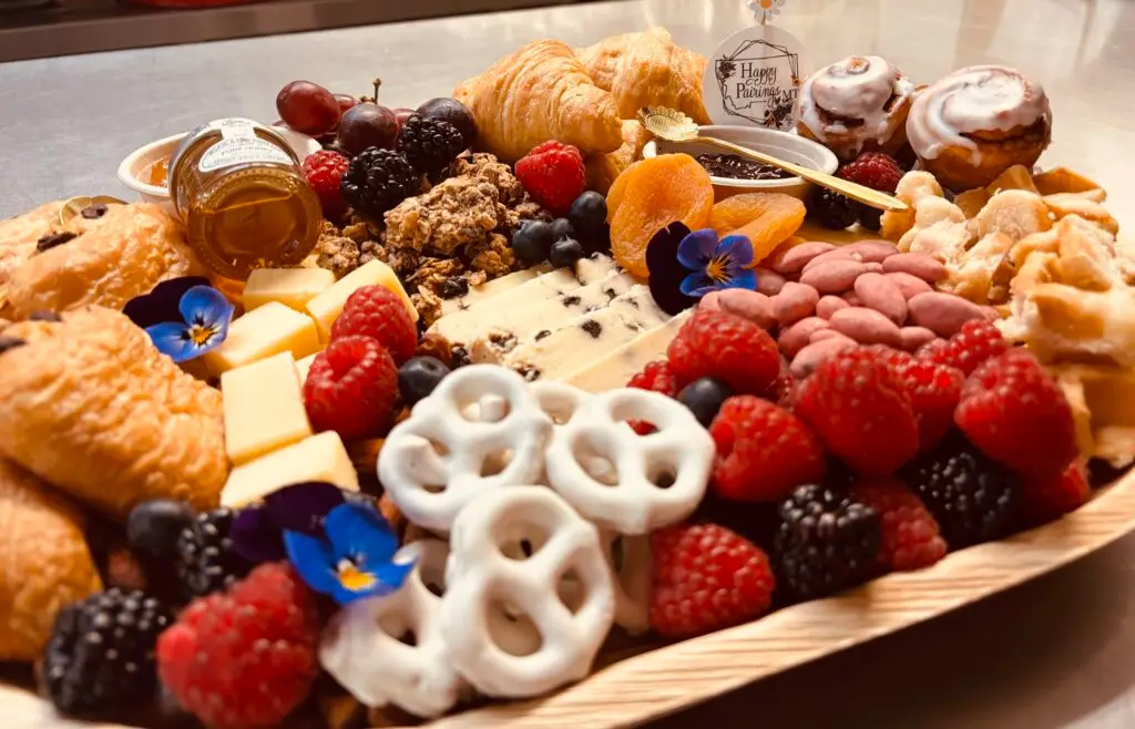 A gourmet charcuterie board featuring brunch food and various appetizers for a perfect dining experience.
